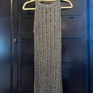 Cocktail dress. Metallic stretch knit.Very flattering